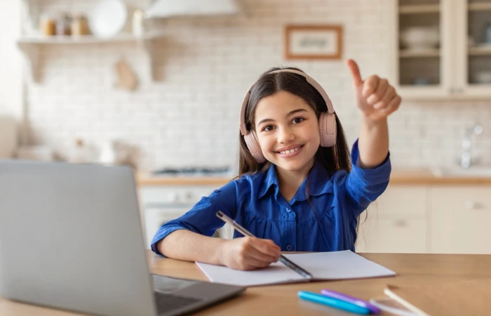 Child attending an online classroom